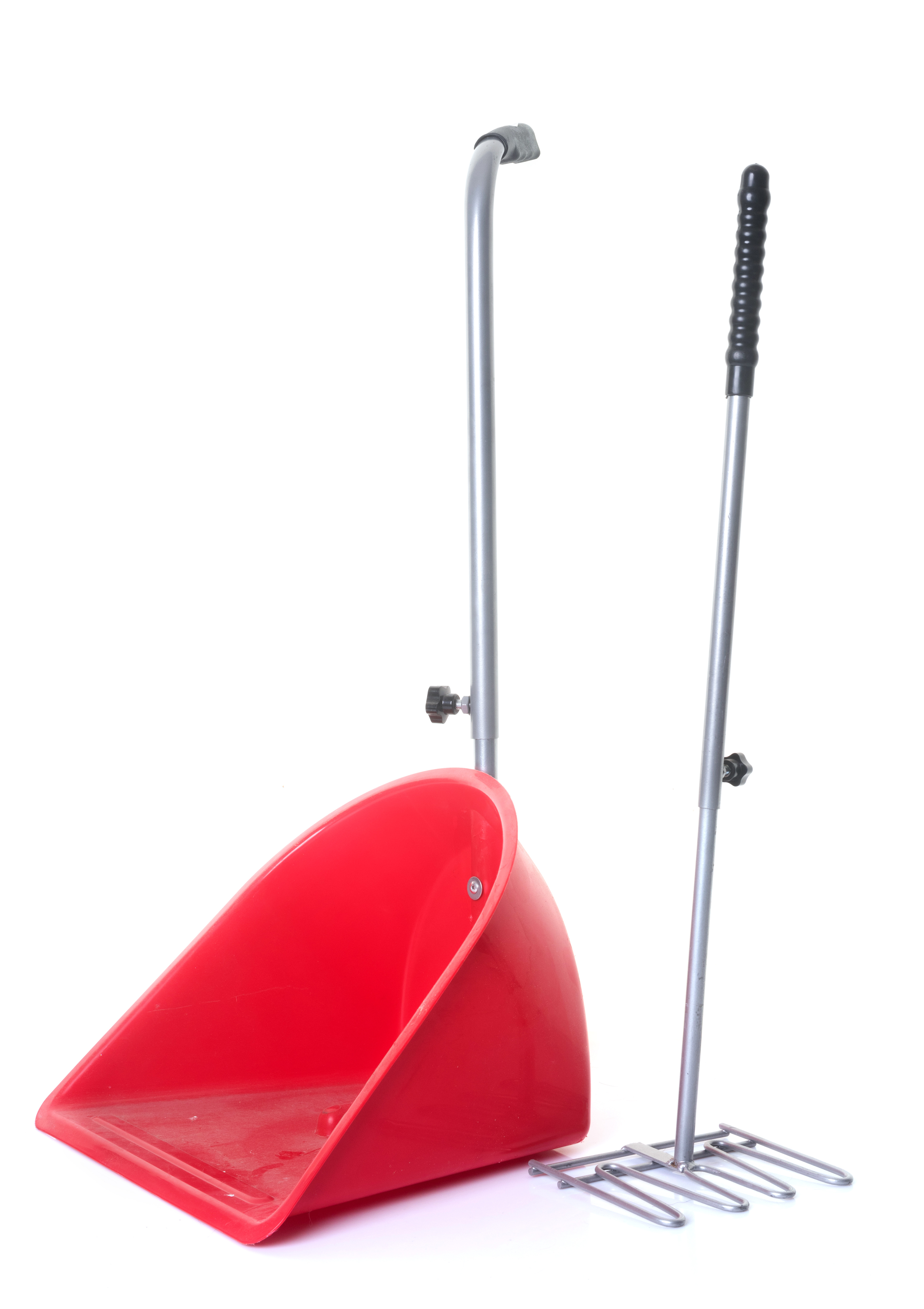 shovel for droppings in front of white background